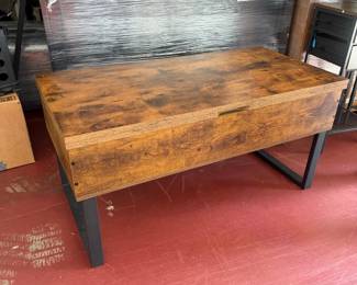 coffee table that opens to a table with storage