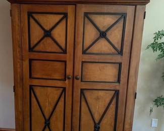Stately designer-style entertainment armoire.