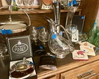 Vintage bars are,leather ice bucket, flasks, decanters