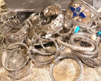 Lots of sterling cuffs and bangles