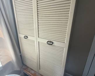 White louvered wardrobe with hanging space & shelves