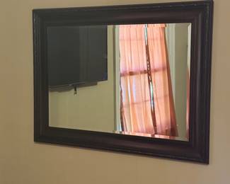 Large dark wood framed wall mirror