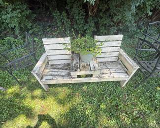 Distressed white wood outdoor bench with center table