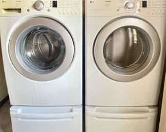 LG White Washer/Dryer set on Pedestal drawers