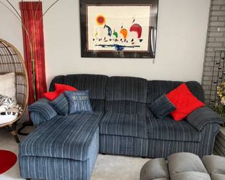 mid-century lamp, L-shape couch, wall art