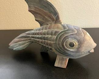 Hand-carved wooden fish sculpture