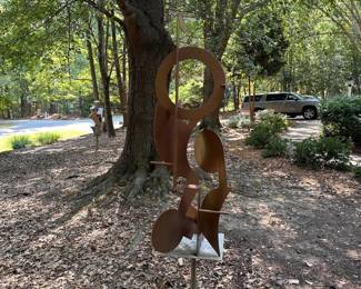 A659 - $450. Mike Roig. Yard Sculpture - Circles. Measures approx. 20"w x 73" tall. Please be prepared to remove yourself. 