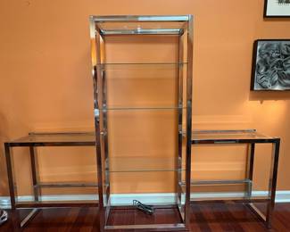 F5 - $750. Chrome and Glass Display Unit. Measures 76” x 12.25” x 60” tall.