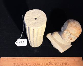 A179 - $125. Baby's Head on Pedestal Sculpture. Measures 3.4" x 11" tall. 