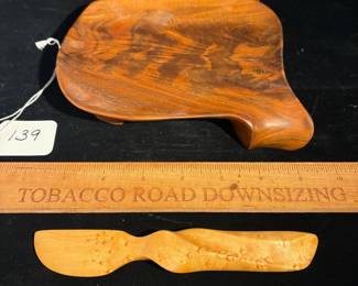 A139 - $60. Holly Tornheim: Wood Art Cheese Plate and Knife. Measures 6.5" x 7". 