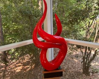 P669 - $375. Tall Red Acrylic Sculpture. Measures 19" wide x 42" tall. Signed. Illegible. Has been used on screened in porch. 