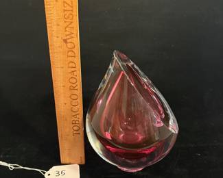 A35 - $60. Robert Deeble Table Vase with sliced top. Measures 5" x 7.5" tall. 