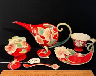 R268 - $200. Franz : Porcelain Hibiscus Collection Sugar, Creamer & Cup. Teapot measures 11.5" x 6" tall. 