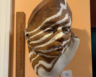 A115 - $125. Michael Barnes : Brown & White Womans Face. Measures 10" x 14". 