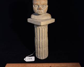 A179 - $125. Baby's Head on Pedestal Sculpture. Measures 3.4" x 11" tall. 