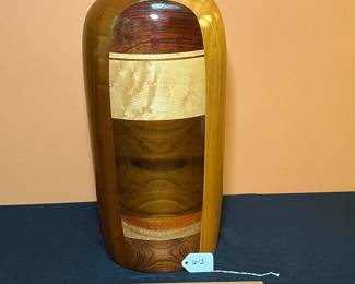 A613 - $95. Paul LaMontagne Mixed Wood Vase. Measures 