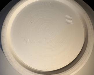 A22 - $125. Leslie Thompson: Black and White Clay Plate. Measures 14.5" diameter. 