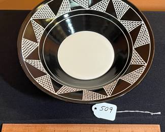 A509 - $30. Black & White Pottery Bowl. Signed MC3. Measures 11" x 3" tall. 