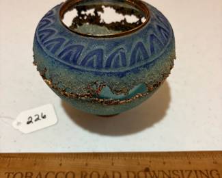 A226 - $225. Keith and Deanna Clayton. Copper and Crystalized Glass Vase. Measures 6" x 5" tall