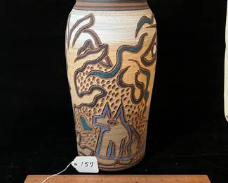 A157 - $65. Mary Wagner Potter "Dog and Man" on Clay Vase. Measures 5.5" x 12" tall. 