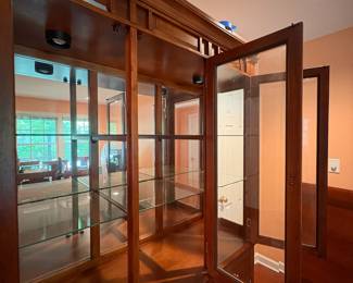 F1 - $250. Lighted China Cabinet. Moves in 2 pieces. Measures 56“ x 18.5” x 81” tall.