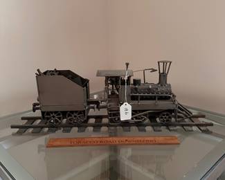 A186 - $75. Locomotive Train Sculpture, all metal construction. Unsigned. Measures 21.5" x 4.5" x 7.5" tall. 