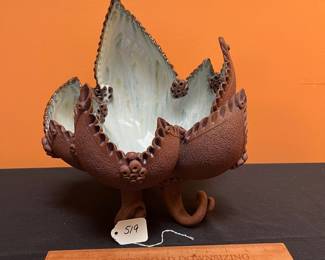 A519 - $125. Bowl with Octopus Feet - Maybe stamped an L? Measures 11" x 13.5" tall. 