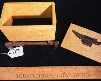 A187 - $40. Will Wipperfurth. Will's Woodworking: Paduk And Maple Box. Measures 6" x 4" x 6.25" tall.