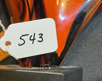 A543 - $175. Signed Art Glass Sculpture. Illegible. Measures 15" x 11" tall. 