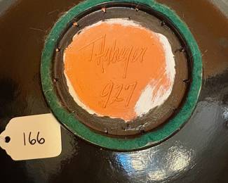 A166 - $200. Terry Habeger : Multi Colored Acrylic on Clay Plate. Measures 17.75" x 4.25" tall. 