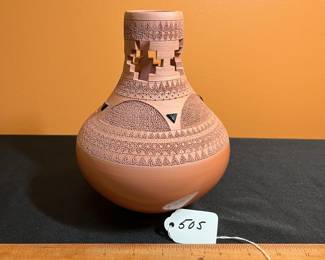 A505 - $65. Pottery Vessel - Likely Navajo. Signed EM? Measures 6" x 8" tall. 