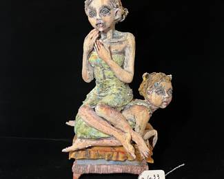 A633 - $85. Girls on an Ottoman - no signature. Measures 7.5" x 5" x 14.25" tall. Leg & Finger have been repaired. 