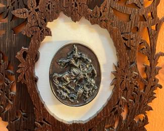 A602 -$350. Black Forest Carved Frame with Silver .999 Henryk Winograd Paperweight. Measures 8" w x 14.5" tall