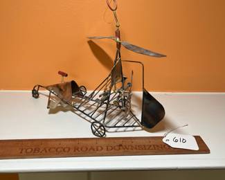 A610 - $30. Measures 4" w x 10.25" d x 9" tall. No signature