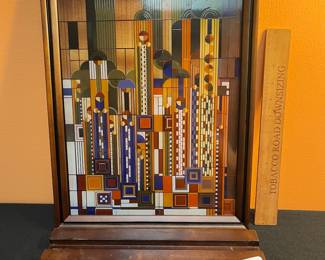 A599 - $100. Frank Lloyd Wright Saguaro Forms and Cactus Flowers stained glass art panel. Measures 12.25"w x 15.75" tall
