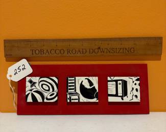 A252 - $100. Abby Salisbury: Sgraffito Wall Plaque. Measures 10" x 4". 