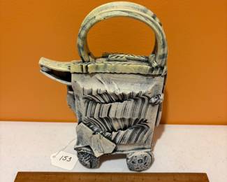 A153 - $125. Jim Stewart Teapot: Raku Gallery. Measures 7" x 2.5" x  10.5" tall. 