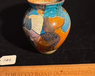 A228 - $225. Dudley Vaccianna : Glass Vase w/ African Images. Measures 5" x 6.25" tall. 