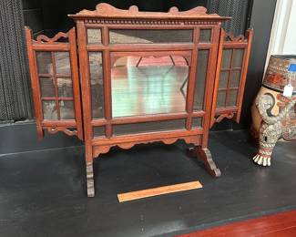 A673 - $225. Decorative Fireplace Screen with Mirror. Measures 32" x 24" tall. 