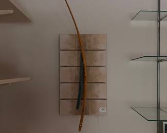 A400 - $75. Wooden Wall Sculpture - Mounted Bow. Signed T. Maddox. Dec. 2011. Measures 12" x 29". 