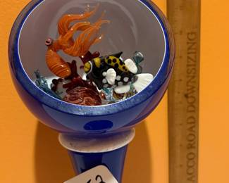 A152 - $500. Peter Muller and Joe Peters: Flame and Fury: Fish In Globe. Measures 5" x 4" x 12" tall. 
