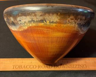 A494 - $25. Orange with Black Rim Vessel signed - TW. Measures 8.5" x 5" tall. 