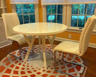 F12 - $195. Crate & Barrel Ypsilon Dining Table. 42" round table x 29.5" tall. Chairs are very worn. Table has been used but is sturdy!