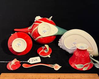 R268 - $200. Franz : Porcelain Hibiscus Collection Sugar, Creamer & Cup. Teapot measures 11.5" x 6" tall. 