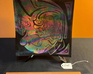 A545 - $30. Signed Art Glass Plate with Woman's face. Measures 10" x 10". 