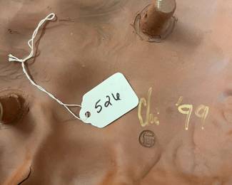 A526 - $175. Wall Sculpture. Signed "Chi '99". Measures 12.5" x 16". 