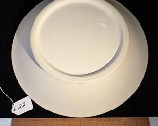 A22 - $125. Leslie Thompson: Black and White Clay Plate. Measures 14.5" diameter. 