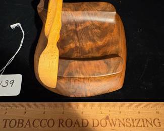 A139 - $60. Holly Tornheim: Wood Art Cheese Plate and Knife. Measures 6.5" x 7". 