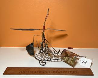 A610 - $30. Measures 4" w x 10.25" d x 9" tall. No signature