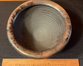 A494 - $25. Orange with Black Rim Vessel signed - TW. Measures 8.5" x 5" tall. 